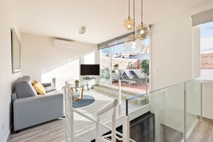 Superior Duplex, 3 Bedrooms, Terrace | Living area | 43-inch Smart TV with digital channels