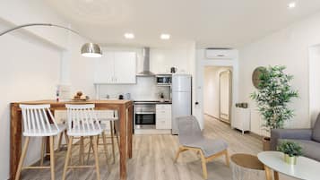Design Apartment, 1 Bedroom | Private kitchen | Full-sized fridge, microwave, oven, stovetop