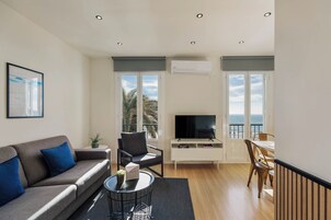 Premium Apartment, 3 Bedrooms, Sea View (Port alegre, 57) | Living area | 43-inch Smart TV with satellite channels