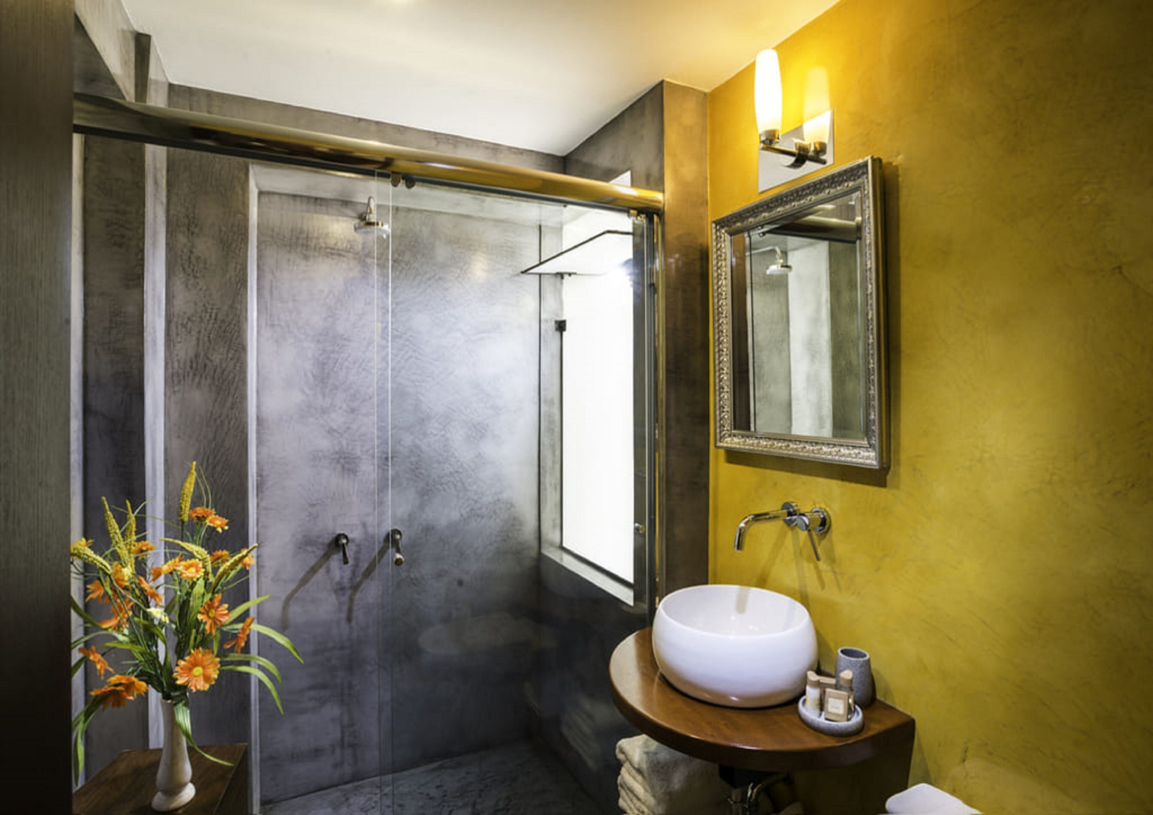 superior room | bathroom | shower, free toiletries, hair dryer, bathrobes