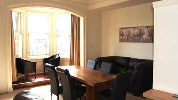 Standard Apartment, 2 Bedrooms (2 doubles + 2 singles + sofa bed) | Living area | LCD TV, DVD player