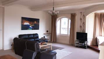 Standard Apartment, 2 Bedrooms (2 doubles + 2 singles + sofa bed) | Living area | LCD TV, DVD player