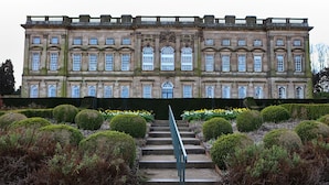 A grand building with a symmetrical facade, large windows, and a central entrance. - Wortley Cottage Guest House (Sheffield)