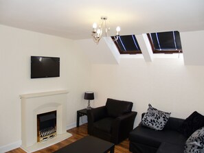 Standard Apartment, 1 Bedroom (2 singles + sofa bed) | Living area - Niddry Street Apartments (Edinburgh)
