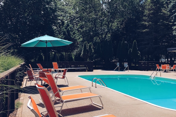 Seasonal outdoor pool, open 10:00 AM to 10:00 PM, free cabanas