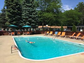 Seasonal outdoor pool, open 10:00 AM to 10:00 PM, free cabanas