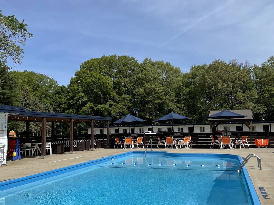 Seasonal outdoor pool, open 10:00 AM to 10:00 PM, free cabanas