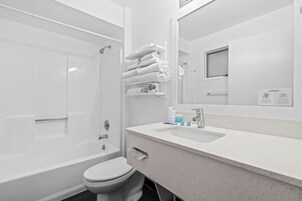 Deluxe Double Room, 2 Queen Beds | Bathroom | Hair dryer, towels