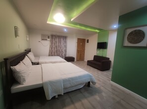 Deluxe Room, Non Smoking | Egyptian cotton sheets, premium bedding, desk, blackout drapes - Nikita's Place Hotel (Calapan)