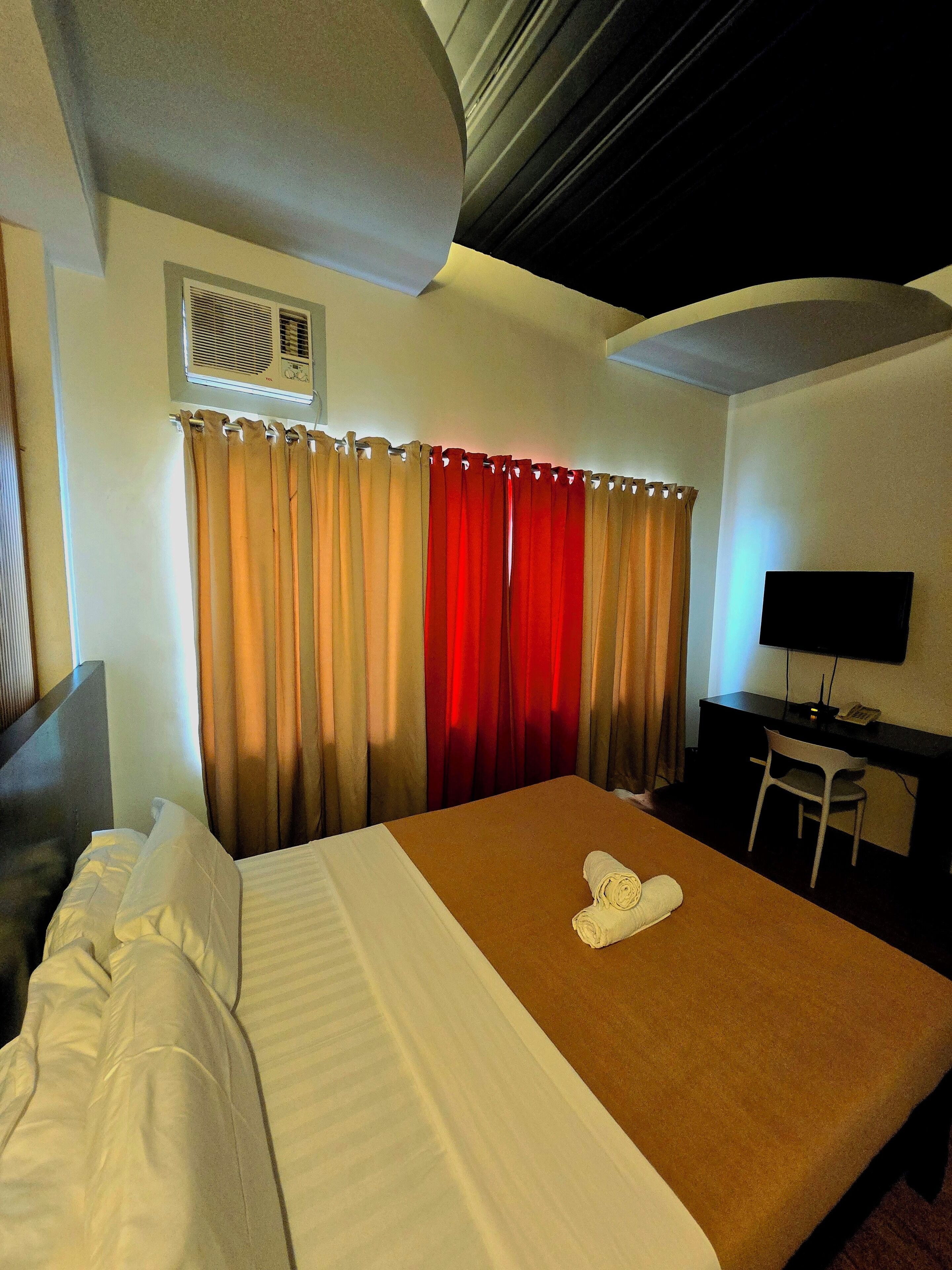 Desk, blackout drapes, rollaway beds, free WiFi