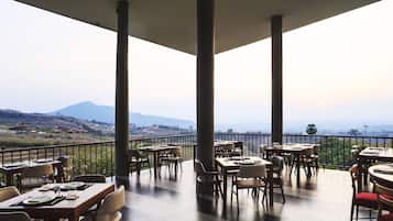 Breakfast, dinner served; international cuisine, garden views