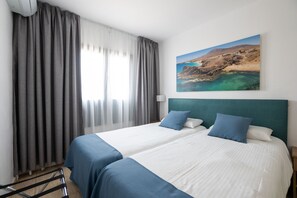 Premium appartement, 1 slaapkamer, terras | 1 slaapkamer, verduisterende gordijnen, gratis babybedden, gratis wifi