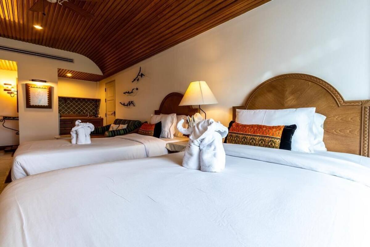 Deluxe kamer, 1 twee- of 2 eenpersoonsbedden | Verduisterende gordijnen, geluiddichte muren, gratis wifi, beddengoed
