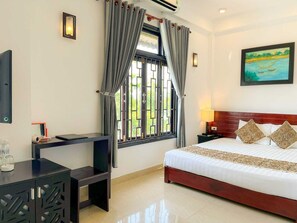 Superior Room, River View | Minibar, desk, blackout drapes, free WiFi