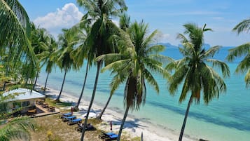 Private beach, beach umbrellas, beach towels, beach bar
