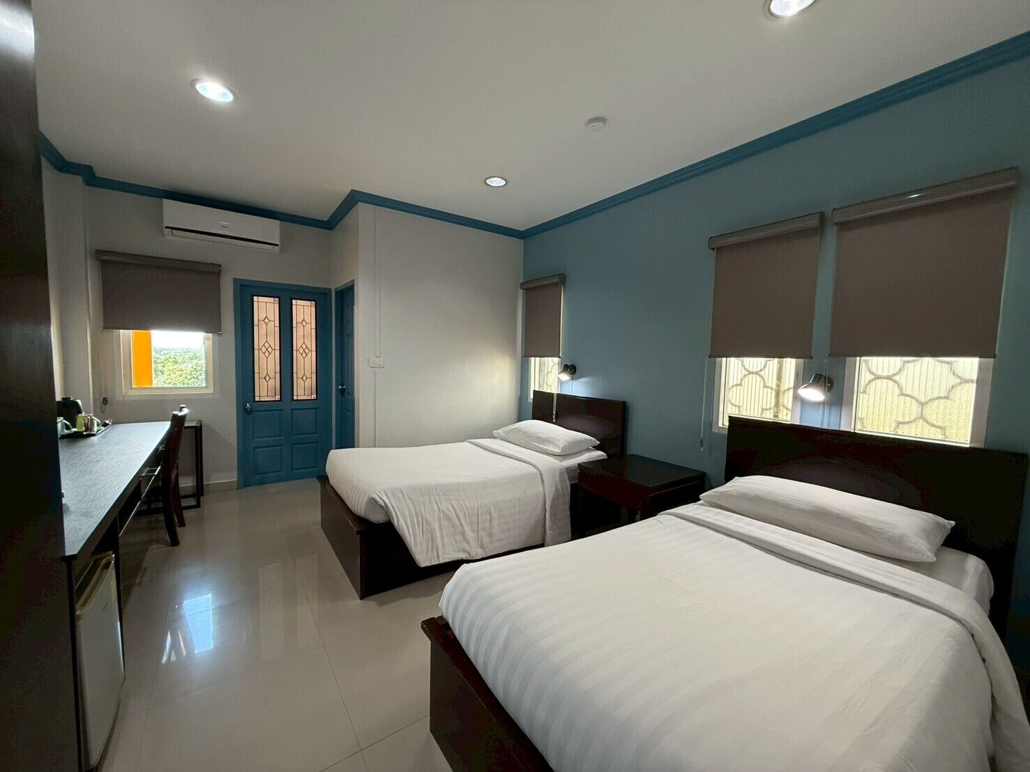 twin room | hypo-allergenic bedding, desk, blackout curtains, free cots/infant beds