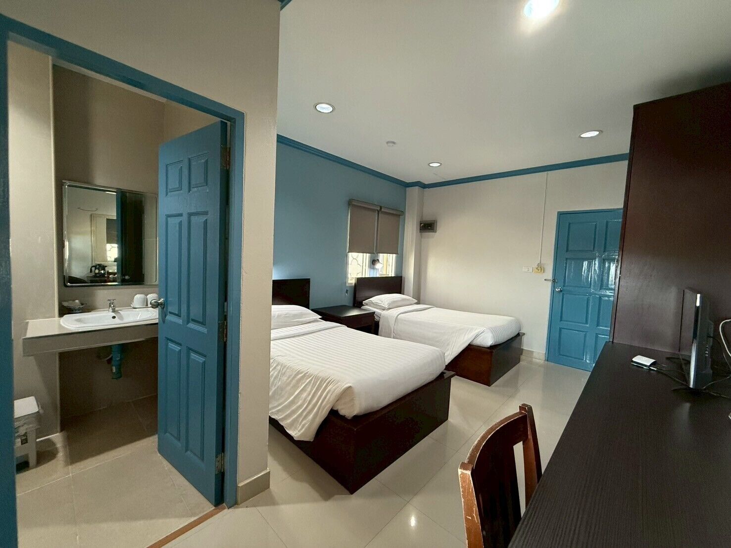 twin room | hypo-allergenic bedding, desk, blackout curtains, free cots/infant beds