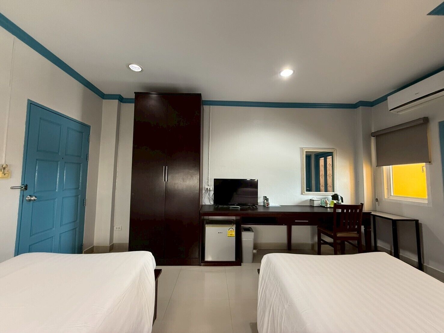 twin room | hypo-allergenic bedding, desk, blackout curtains, free cots/infant beds