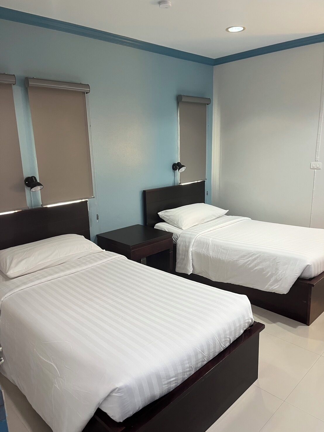 twin room | hypo-allergenic bedding, desk, blackout curtains, free cots/infant beds