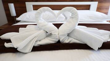 Deluxe Double Room, Balcony, Sea View | Minibar, in-room safe, desk, blackout drapes