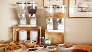 A breakfast buffet with various food items and containers. - Hotel Murter (Murter-Kornati)