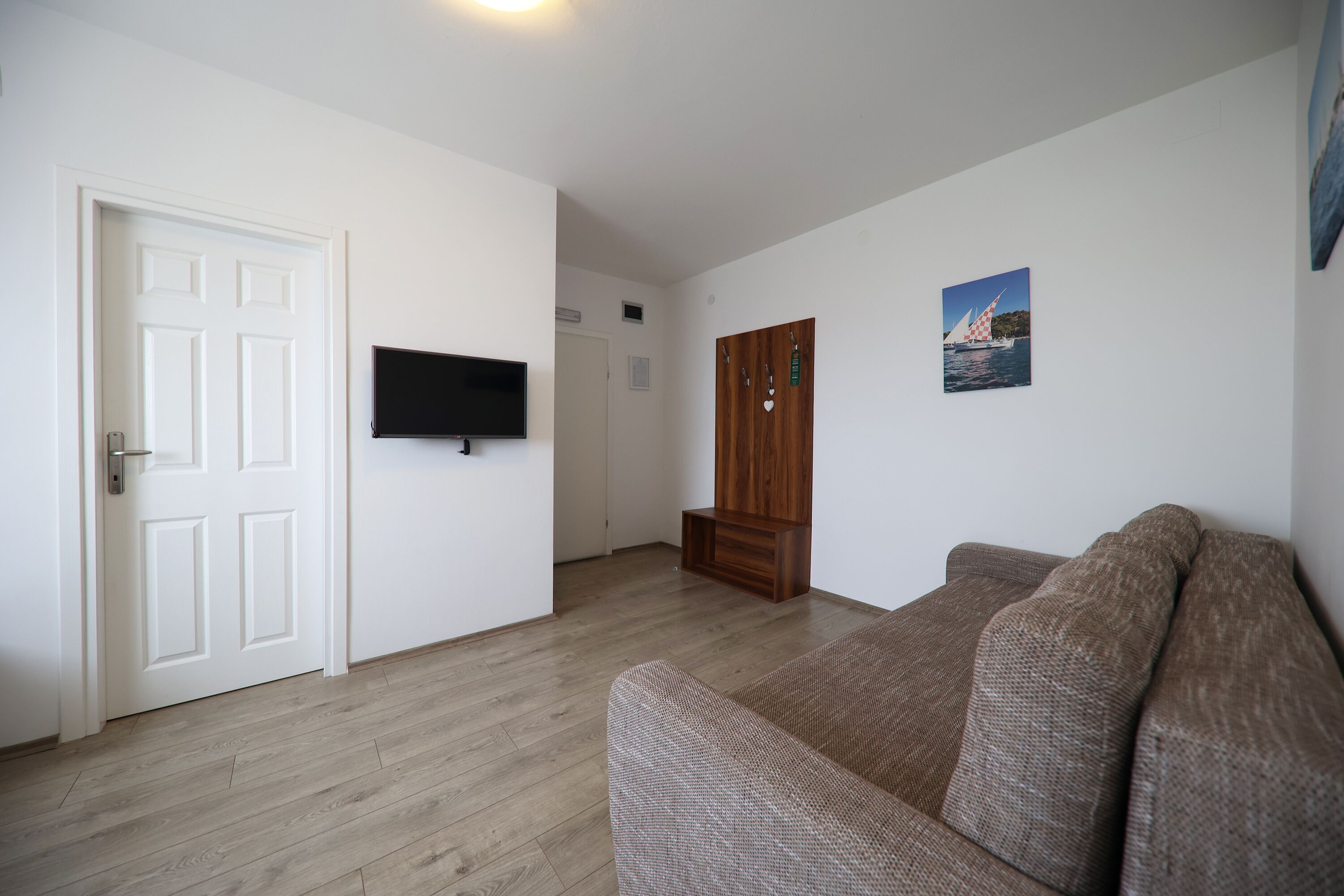 deluxe double room, balcony, sea view | minibar, in-room safe, desk, blackout curtains