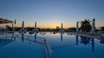 Outdoor pool, open 11:00 AM to 8:00 PM, pool umbrellas, sun loungers