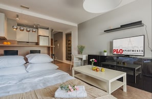 Sistema de insonorización y tabla de planchar con plancha