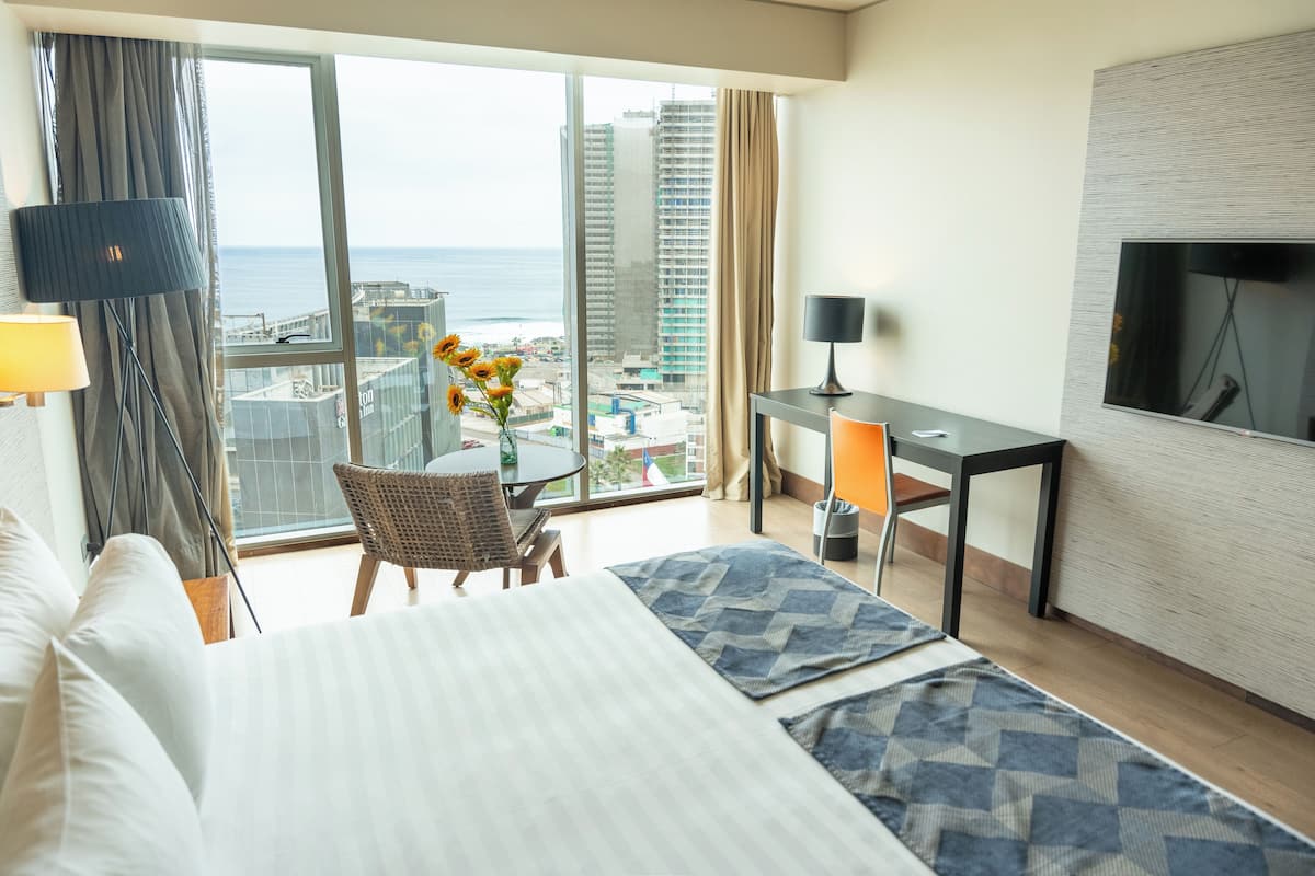 Suite, 1 King Bed, Sea View | Premium bedding, minibar, in-room safe, individually furnished