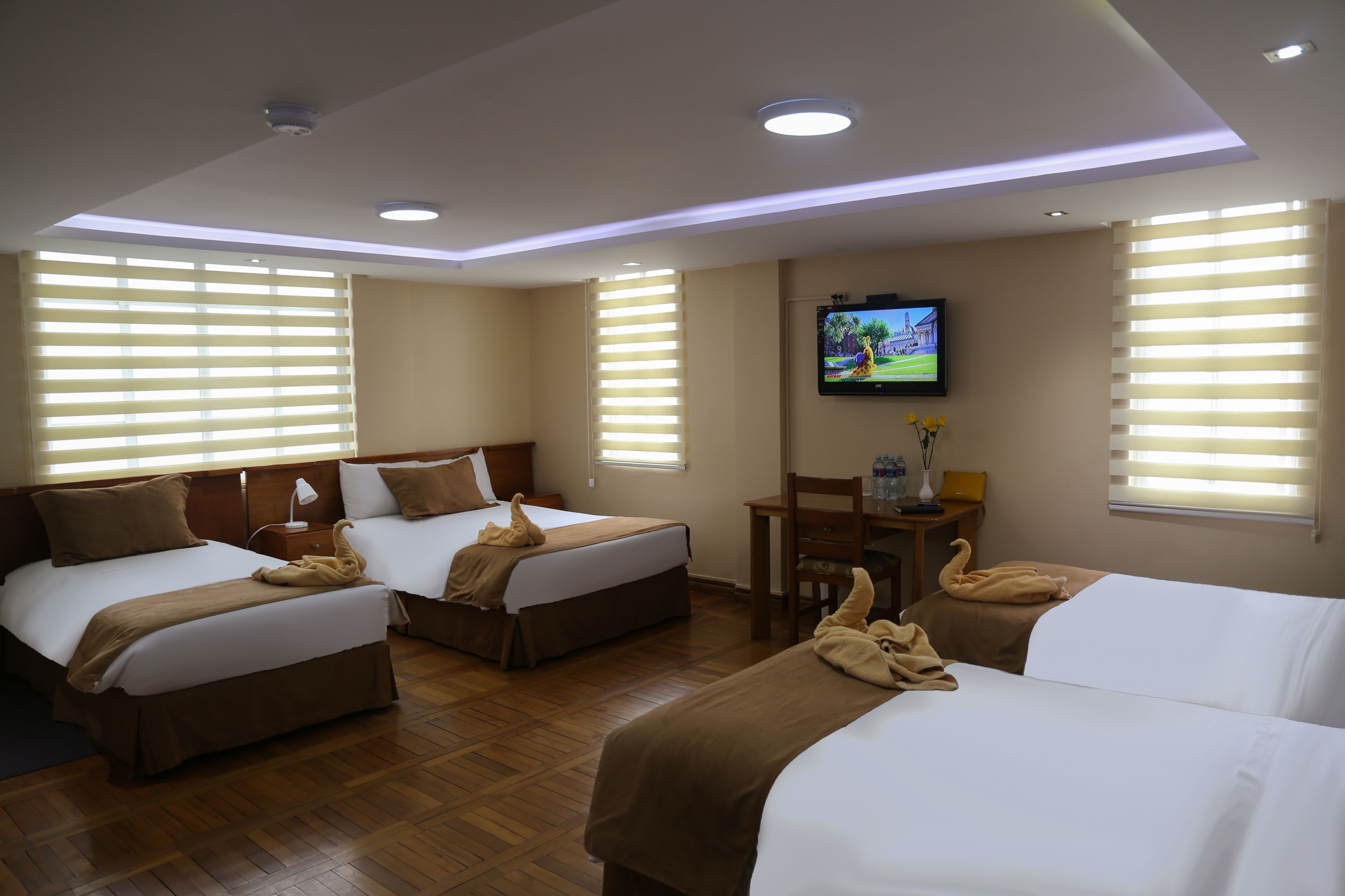 family quadruple room | premium bedding, in-room safe, desk, laptop workspace