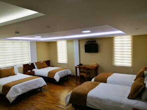 Family Quadruple Room | Premium bedding, in-room safe, desk, laptop workspace