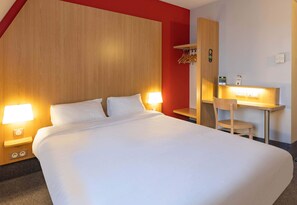Premium bedding, desk, laptop workspace, soundproofing