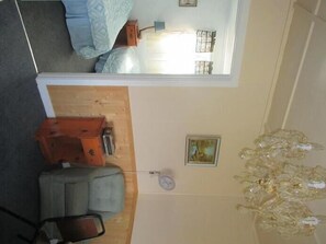 Cottage, 2 Bedrooms (1 king and 2 single beds) | Living area | TV