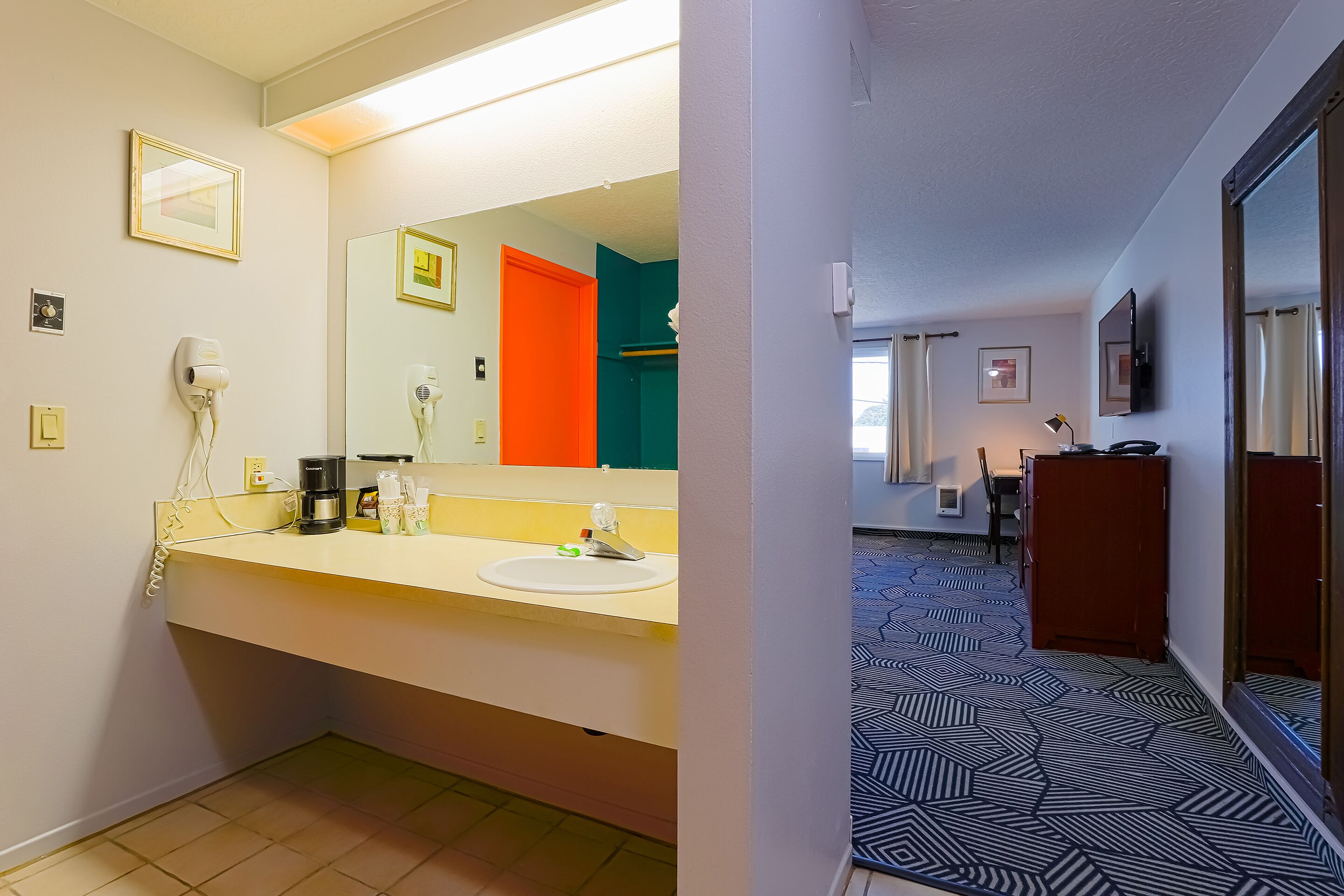 room, 2 queen beds | bathroom | free toiletries, hair dryer, towels