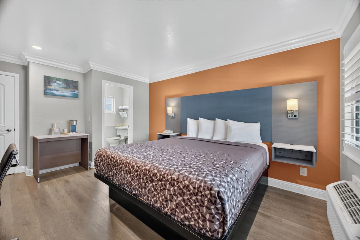 Standard Room, 1 King Bed | Desk, iron/ironing board, WiFi (free), bed sheets