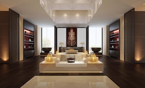 A modern spa room with a central seating area, a large window, and decorative screens. - Sheraton Shanghai Jiading Hotel (Shanghai)