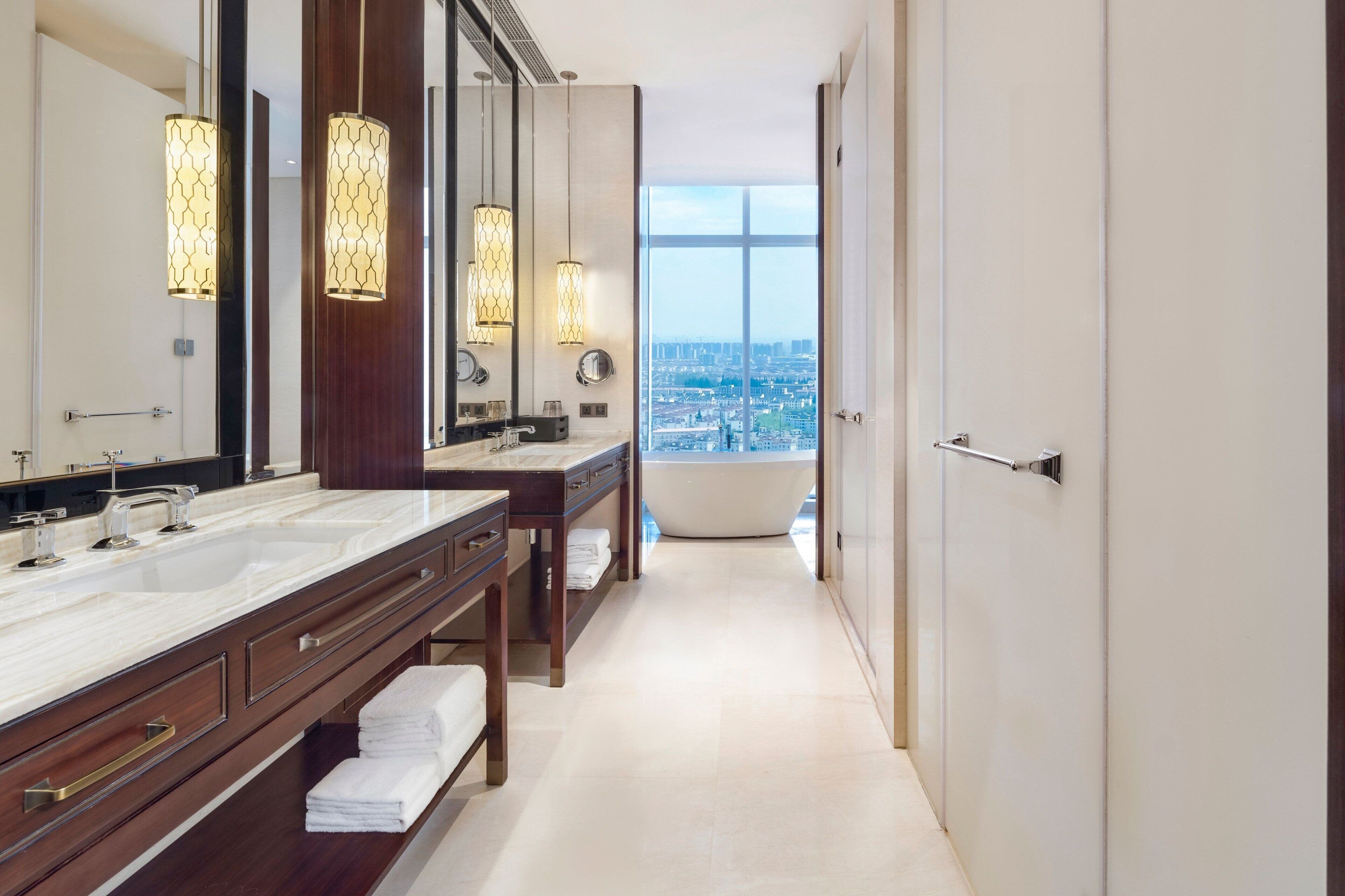 combined shower/bathtub, deep-soaking bathtub, designer toiletries