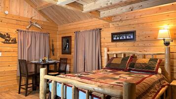 Yukon Cabin (Shared Restroom) | Premium bedding, individually decorated, individually furnished