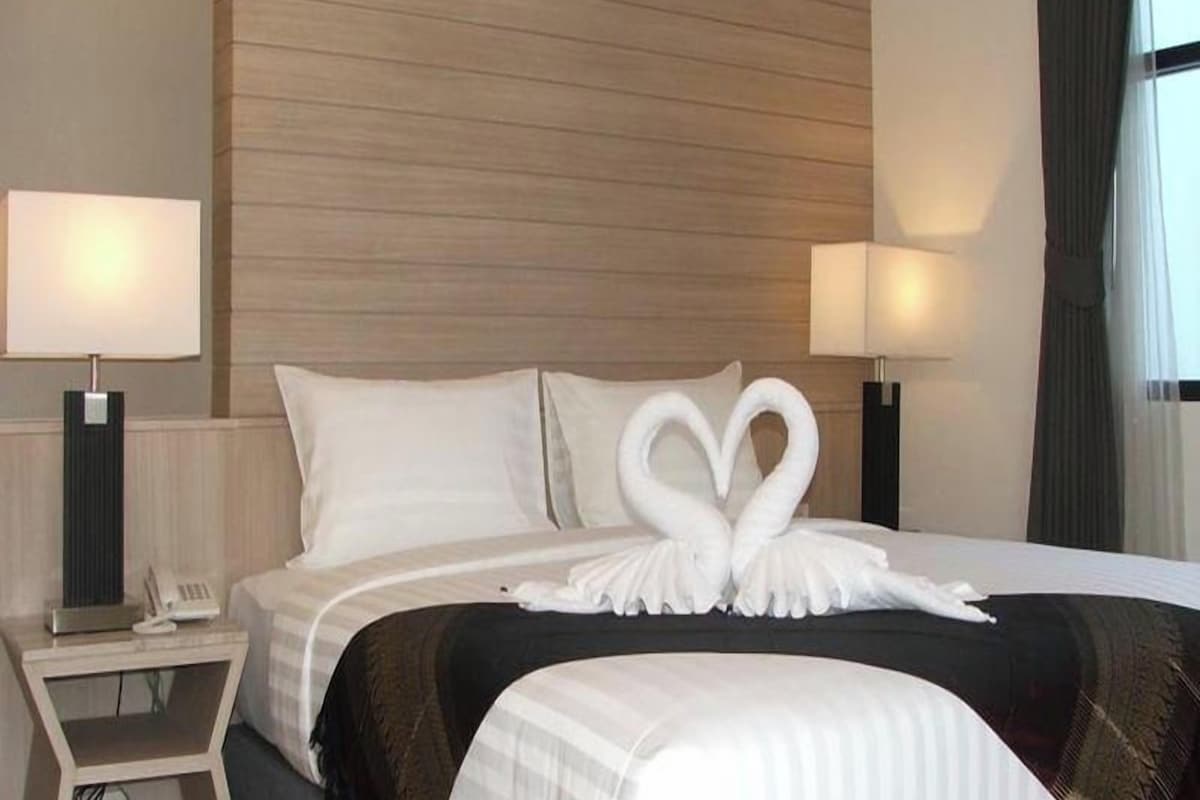 Hypoallergeen beddengoed, een minibar, een kluis op de kamer, een bureau