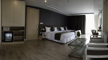 Senior Quadruple Room | Minibar, in-room safe, free WiFi