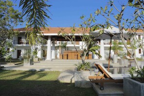 Outdoor pool, open 8:00 AM to 8:00 PM, pool umbrellas, pool loungers