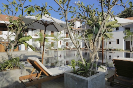 Outdoor pool, open 8:00 AM to 8:00 PM, pool umbrellas, sun loungers. Tamarind Tree Hotel