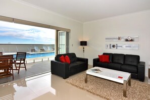 Premium Apartment, 1 Queen Bed | Living area | Flat-screen TV, DVD player - Bunbury Seaview Apartments (South Bunbury)