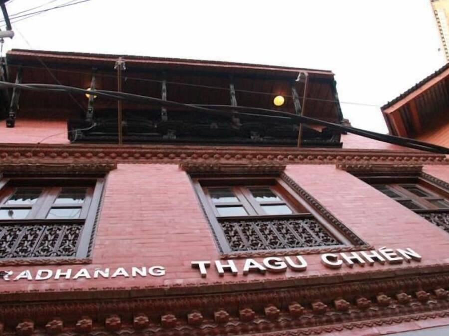 A building with the name "FRADHANANG THAGU CHREN" on its facade.