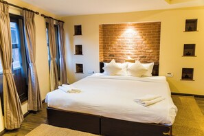 Premium Studio Suite, 1 Double Bed, Ensuite, Mountain View | Iron/ironing board, rollaway beds, free WiFi, bed sheets - THAGU CHHEN A Boutique hotel (Bhaktapur)