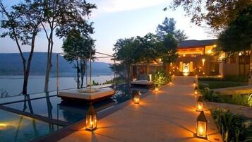 Escape to a serene lakeside retreat with a swimming area and tranquil views.