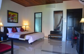 デラックス ルーム ガーデンビュー | ミニバー、デスク、遮光カーテン、防音設備