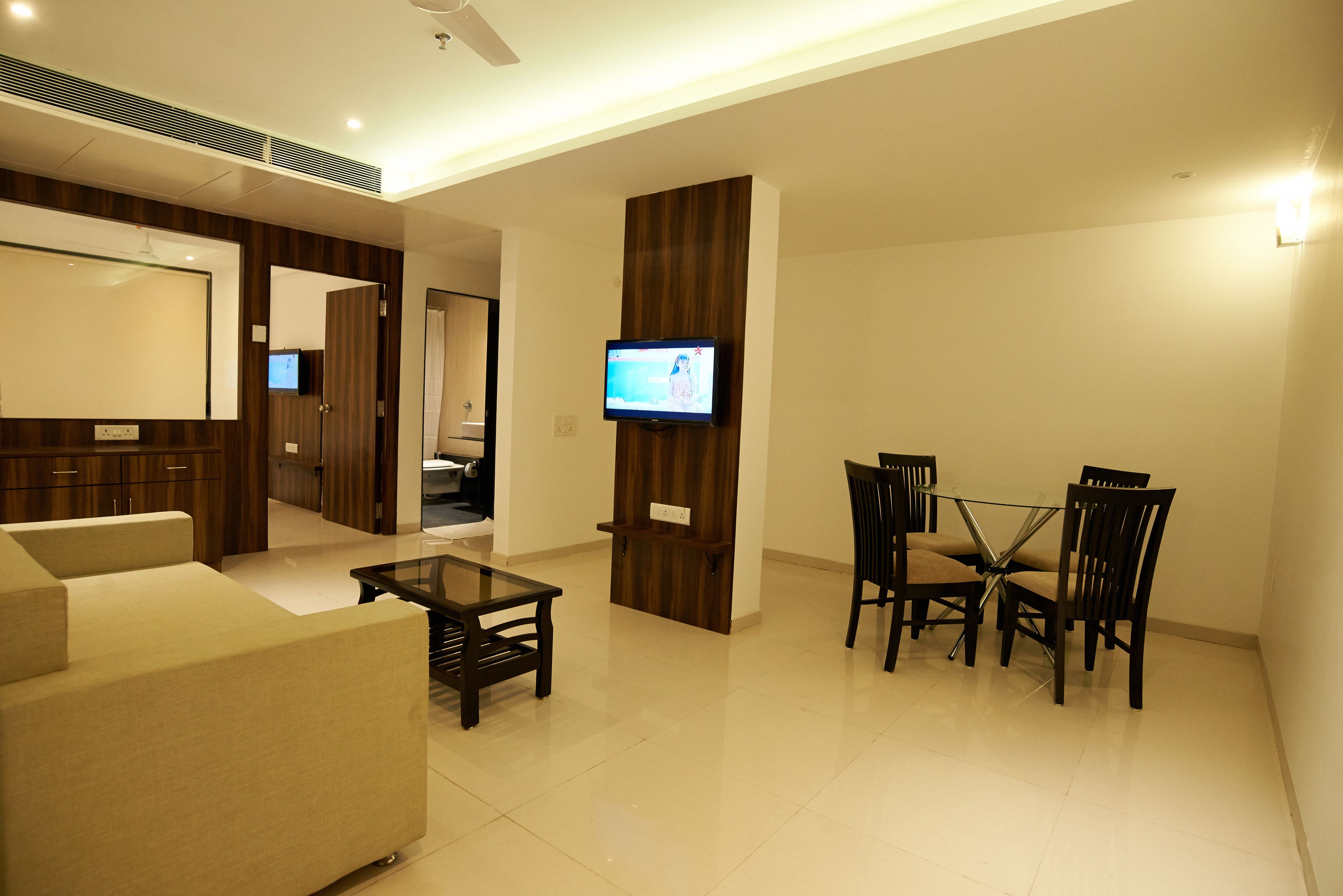 Luxury Suite, 1 Bedroom | Living area | LED TV