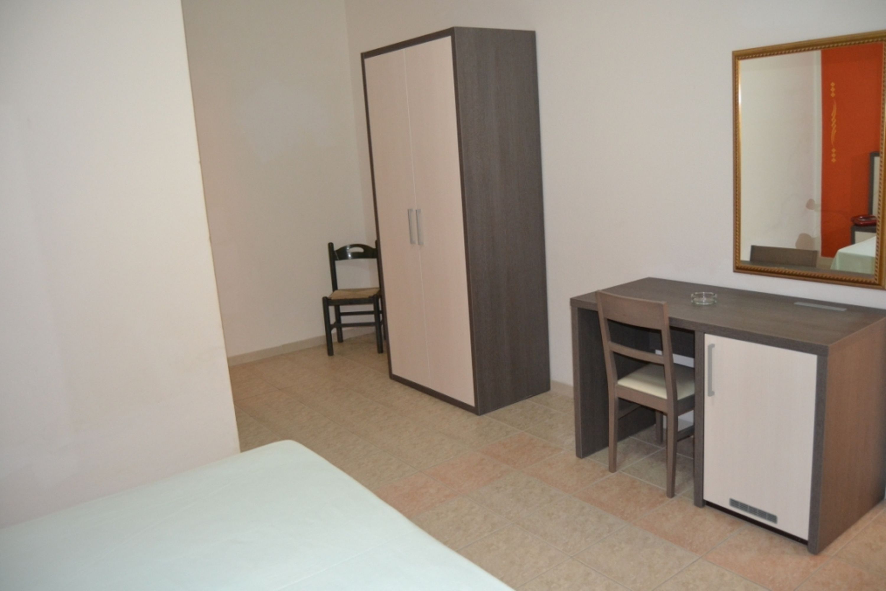 Habitación doble, en edificio contiguo