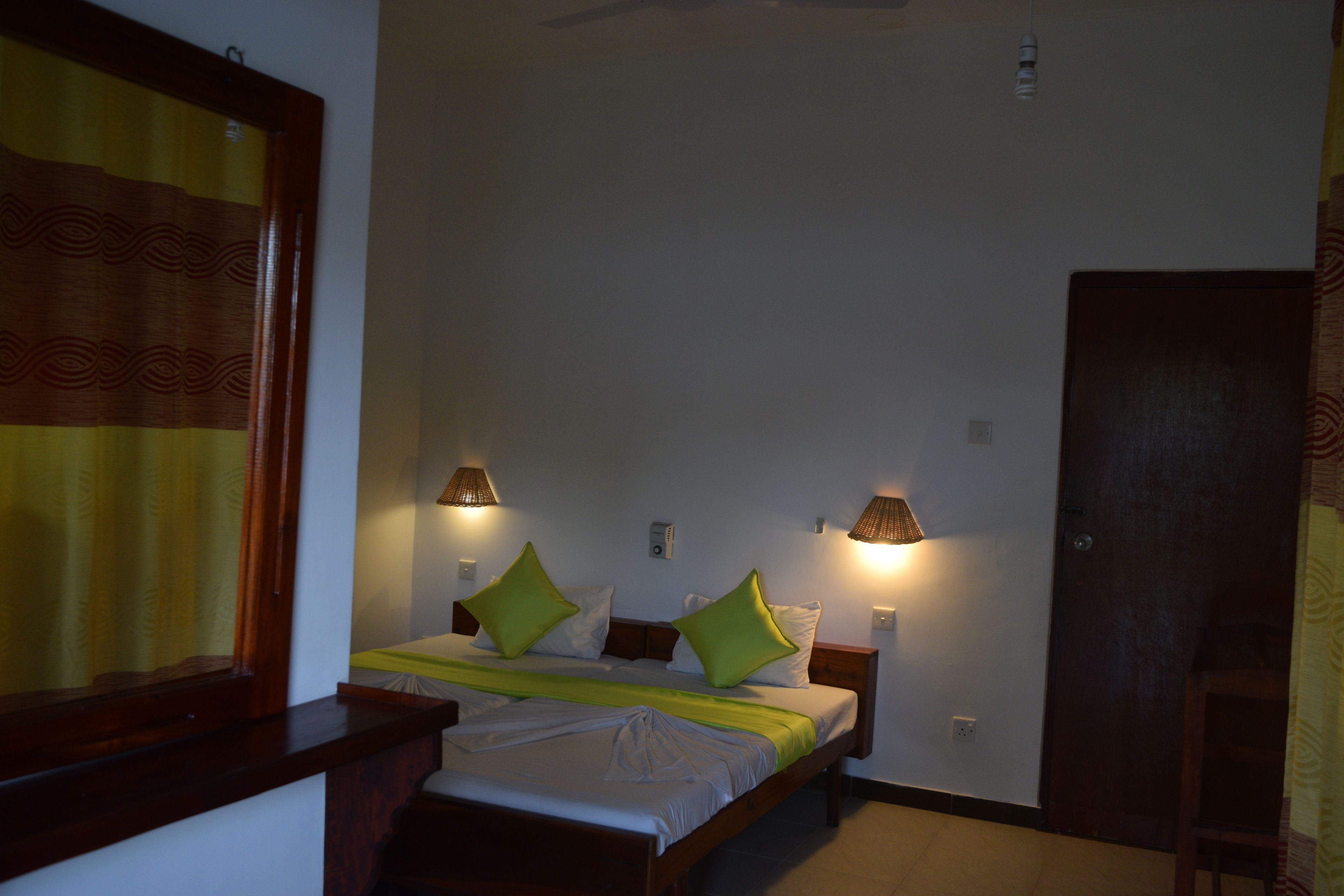 standard room (ac) | in-room safe, desk, cots/infant beds